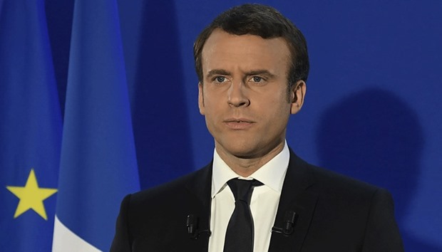 Emmanuel Macron delivers a speech at his campaign headquarters in Paris yesterday.