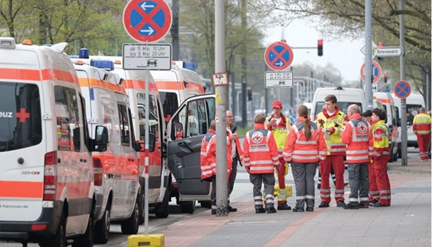 Ambulances and emergency medical personnel are seen in Hanover during the evacuation operation.