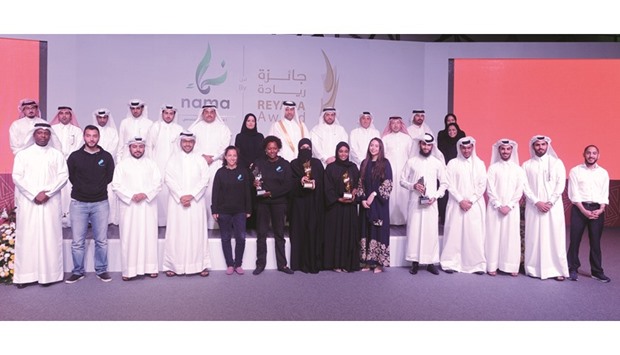 HE Minister of Economy and Commerce Sheikh Ahmed bin Jassim bin Mohamed al-Thani and other dignitaries with winners of the Reyada awards yesterday. PICTURE: Shemeer Rasheed