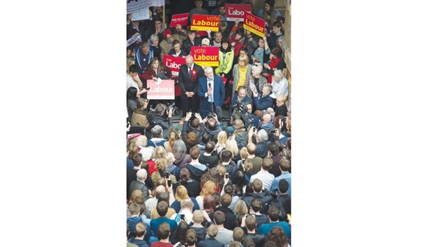 Opposition Labour Party leader Jeremy Corbyn addresses campaigners and members of the public outside the Town Hall in Royal Leamington Spa, central England, yesterday.