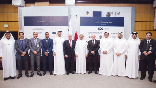 The officials at the MoUs signing ceremony yesterday.