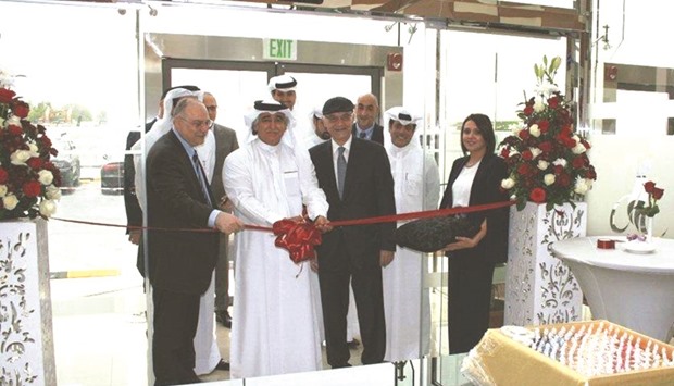 Doha Insurance Group chairman Sheikh Nawaf formally inaugurating the companyu2019s new branch at the Industrial Area in the presence of senior executives.