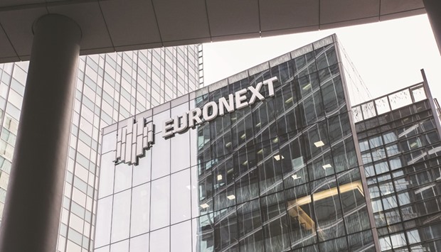 The Euronext logo is seen on the exterior of the Paris Stock Exchange in La Defence business district. Paris stocks ended down 0.9% at 5,382.95 points yesterday.