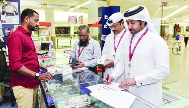 CRA officials during a routine inspection of telecom market
