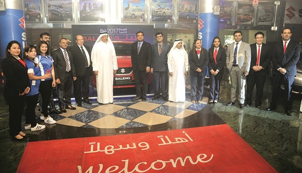 Al-Mannai and other officials at the launch of the new-age hatchback version of the Suzuki Baleno.