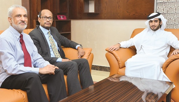 Sheikh Mohamed bin Abdulrahman bin Ahmed bin Mohamed al-Thani with Anoop Patel and Nisairy al-Tahir.
