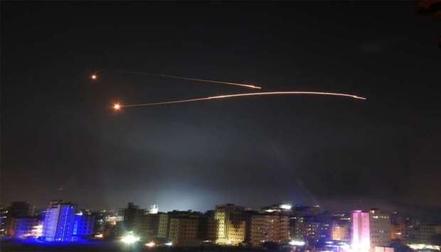 Missiles fire is seen over Damascus