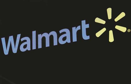 The Walmart logo is displayed on a screen on the floor of the New York Stock Exchange. Walmartu2019s international reach sprawls across 6,360 stores in about two dozen countries from Argentina to Zambia.
