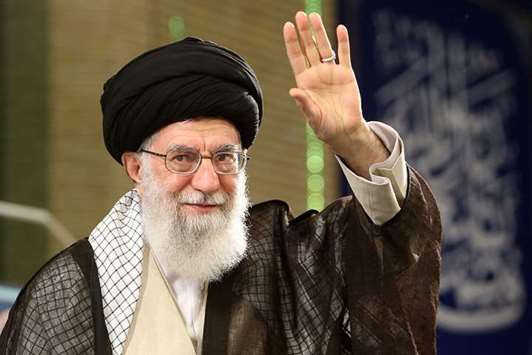 A handout picture provided by the office of Iranu2019s Supreme Leader yesterday, shows Ayatollah Ali Khamenei waving to the crowd as he delivers a speech during Labour Day at the workersu2019 meeting.