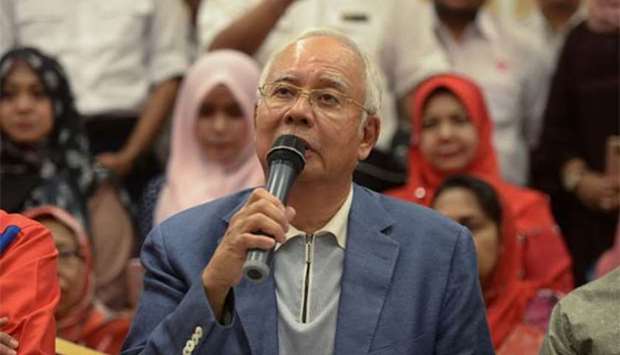 Ousted Malaysian prime minister Najib Razak speaks during a news conference in Kuala Lumpur on Saturday.