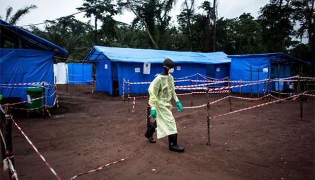 Health workers are seen at an Ebola quarantine unit in Muma. File picture