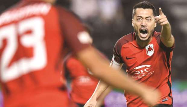 Al Rayyanu2019s Rodrigo Tabata celebrates after scoring a goal against Al Gharafa during their Amir Cup semi-final at Jassim Bin Hamad Stadium yesterday. PICTURES: Noushad Thekkayil and Shemeer Rasheed