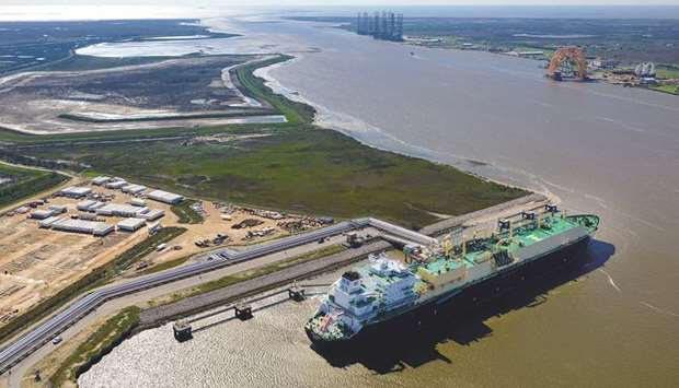 The Asia Vision LNG carrier sits docked at the Cheniere Energy terminal in this aerial photograph taken over Sabine Pass, Texas February 24, 2016. Only Cheniere and Dominion Energy are currently exporting US shale gas worldwide, but as many as three more projects could be up and running in the next year.