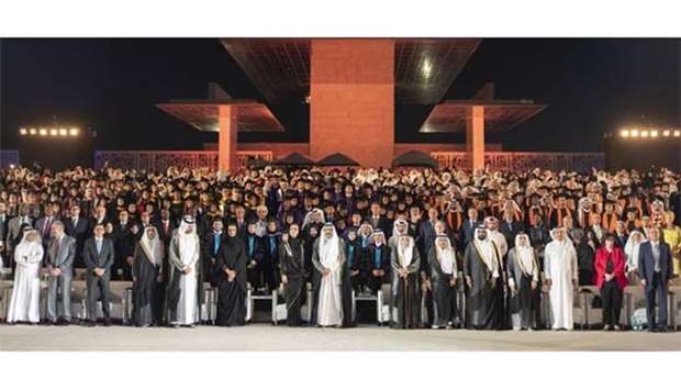 His Highness the Father Amir Sheikh Hamad bin Khalifa al-Thani, QF chairperson Her Highness Sheikha Moza bint Nasser, QF vice chairperson and CEO HE Sheikha Hind bint Hamad al-Thani and other dignitaries with the graduating students.
