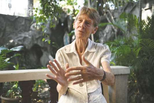 Australian nun Patricia Fox gestures during an interview at her residence in Manila.