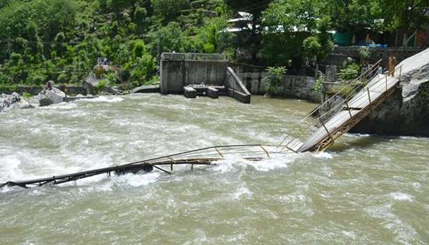 Bridge collapses into river in Pakistan