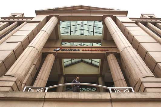 Bursa Malaysia signboard is seen at its headquarters in Kuala Lumpur. Market watchers expect equities to fall across the board, with government-linked companies,  benchmark index stocks and infrastructure companies taking the brunt of a potential selloff.