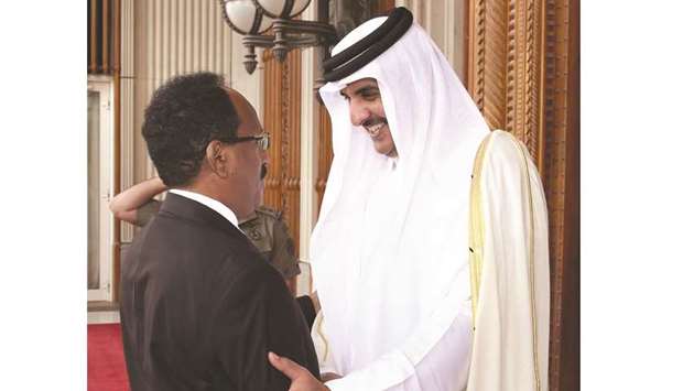 His Highness the Amir Sheikh Tamim bin Hamad al-Thani with Somali President Mohamed Abdullahi Farmajo in Doha in this 26 May 2017 file picture.