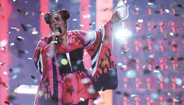 Barzilai performs with the trophy after winning the final of the 63rd edition of the Eurovision Song Contest.