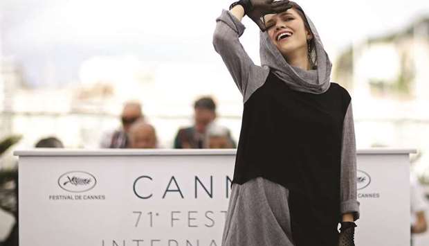 Iranian actress Marziyeh Rezaei poses during the photocall for the film Three Faces, in competition at the 71st edition of the Cannes Film Festival.