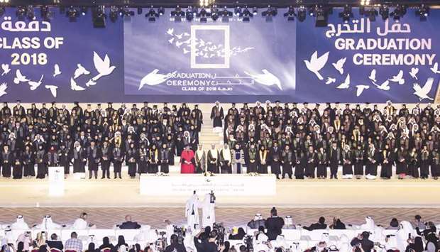 The graduates with HE the Prime Minister and Interior Minister Sheikh Abdullah bin Nasser bin Khalifa  al-Thani and other dignitaries. (supplied picture)