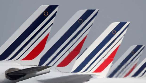 The tails of Air France airplanes parked at the Charles-de-Gaulle airport are seen in Roissy