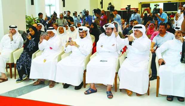 Senior Ooredoo executives among others during the announcement on the live 5G network