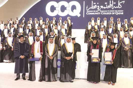 HE the Prime Minister and Interior Minister Sheikh Abdullah bin Nasser bin Khalifa al-Thani and CCQ president and Undersecretary of Ministry of Education and Higher Education Dr Ibrahim al-Naimi with the graduates.