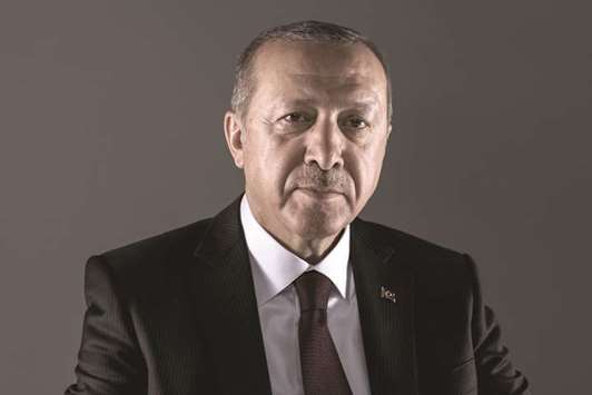 Recep Tayyip Erdogan, Turkeyu2019s president, poses for a photograph following a Bloomberg Television interview in London on Monday. Erdogan said he intends to tighten his grip on the economy and take more responsibility for monetary policy if he wins an election next month.