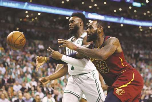 LeBron James (right) of the Cleveland Cavaliers battles for the ball against Jaylen Brown of the Boston Celtics in the first-half during game two of the 2018 NBA Eastern Conference Finals at TD Garden in Boston, Massachusetts. (Getty Images/AFP)