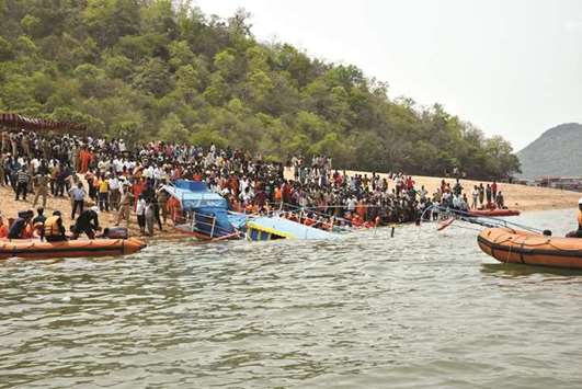 Rescue operations underway after a boat capsized in the Godavari river in Andhra Pradesh.