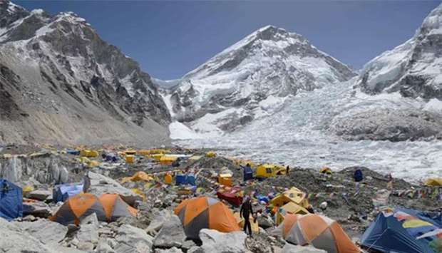 A climber walks through Everest base camp, some 140 km northeast of the Nepali capital Kathmandu. The Everest industry is suffering from a shortage of experienced Sherpa guides.