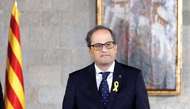 Torra delivers a speech after taking office at an official swearing-in ceremony at the Generalitat Palace in Barcelona.