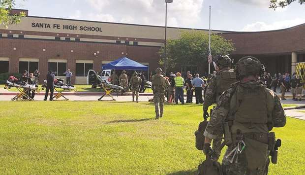 Law enforcement and medical personnel at the Santa Fe High School following a shooting incident.