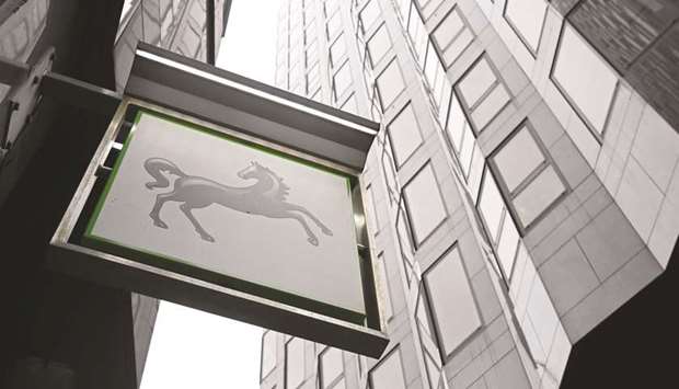 A sign hangs outside a Lloyds Bank branch in London. Lloyds has sold its Irish residential mortgage portfolio to Barclays for around $5.4bn in cash, as part of a plan to focus on its core British market.