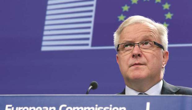 European Economic and Monetary Affairs Commissioner Olli Rehn addresses a news conference in Brussels yesterday. The EC said yesterday it u201claunched the formal process to activate the blocking statute by updating the list of US sanctions on Iran falling within its scope.u201d