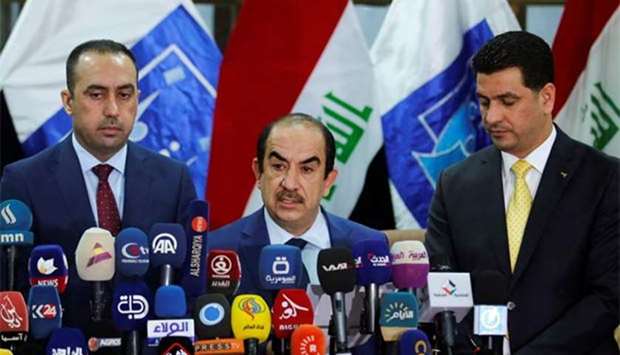 Riyadh al-Badran, head of Iraq's Independent Higher Election Commission, speaks during a news conference on the final results of the election in Baghdad early on Saturday.