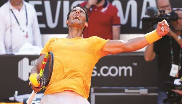 Spainu2019s Rafael Nadal celebrates his win over Serbiau2019s Novak Djokovic (inset) in the Italian Open semi-final in Rome yesterday. (Reuters/AFP)