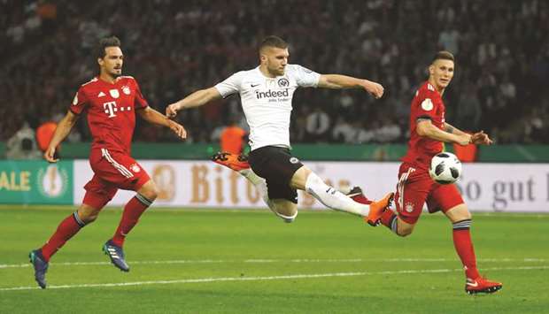 Eintracht Frankfurtu2019s Ante Rebic (centre) scores a goal against Bayern Munich during the German Cup final in Berlin yesterday. (Reuters)