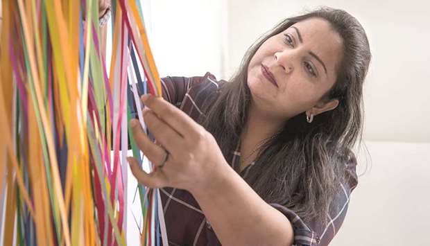 ARTIST AT WORK: Shazia Bhanji in the thick of the action.