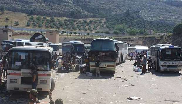 Buses at the Yarmuk Palestinian refugee camp