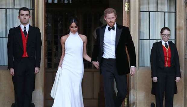 Prince Harry and Meghan Markle leave Windsor Castle on Saturday after their wedding.