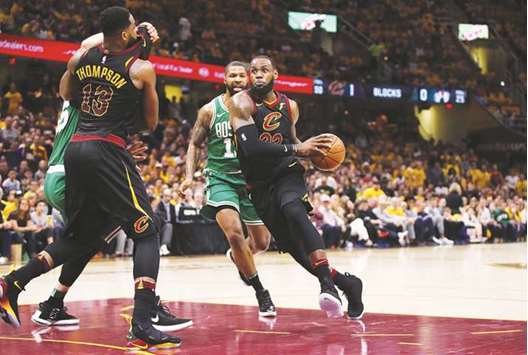 LeBron James (right) of the Cleveland Cavaliers drives to the basket against Boston Celtics in the first-half during game three of the 2018 NBA Eastern Conference Finals at Quicken Loans Arena in Cleveland, Ohio. (Getty Images/AFP)