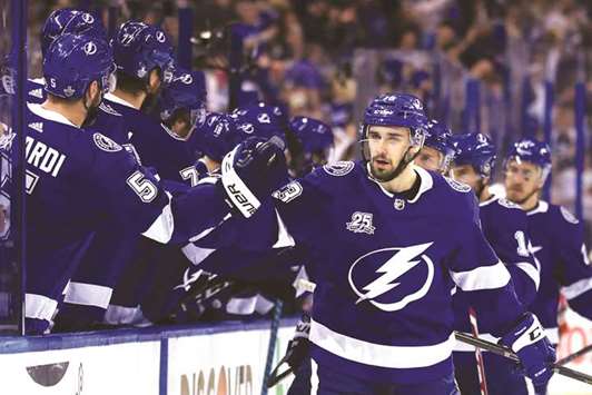 Cedric Paquette (No 25) of the Tampa Bay Lightning celebrates with teammates after scoring a goal against Washington Capitals during the first period in game five of the Eastern Conference Finals during the NHL Stanley Cup Playoffs at Amalie Arena in Tampa, Florida. (Getty Images/AFP)