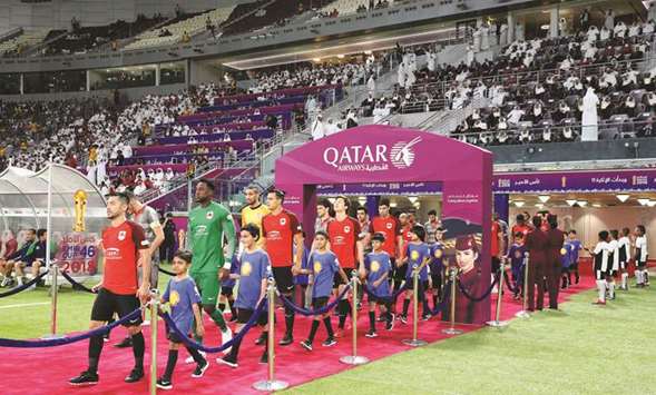 Al Rayyan and Al Duhail players walk out on to the pitch for the Amir Cup final on Saturday.