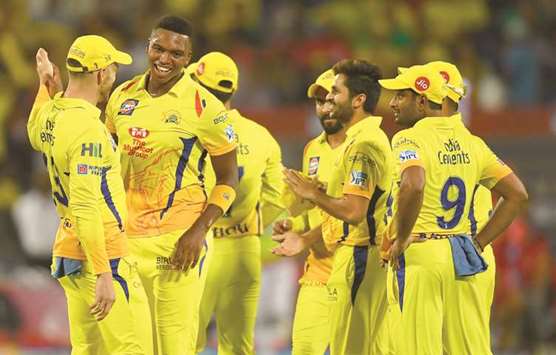 Chennai Super Kingsu2019 Lungi Ngidi (second left) celebrates with teammates after taking a Kings XI Punjab wicket during their IPL match in Pune yesterday. (AFP)