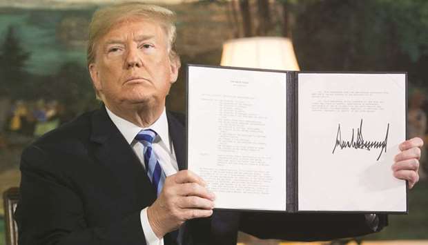 President Donald Trump reinstating sanctions on Iran on May 8 at the White House.