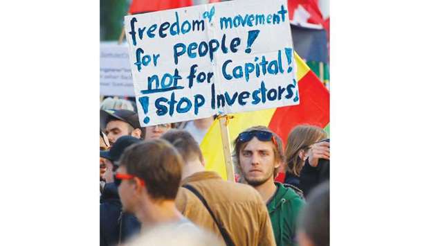 People gather yesterday ahead of May Day demonstrations in Berlin.