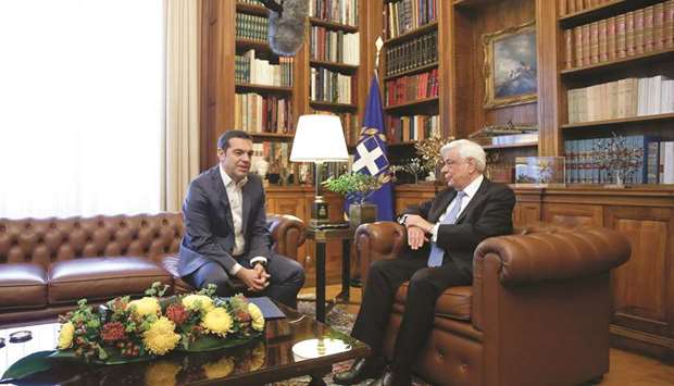 Tsipras briefing Greek President Prokopis Pavlopoulos in Athens on Saturday on the name dispute with Macedonia.