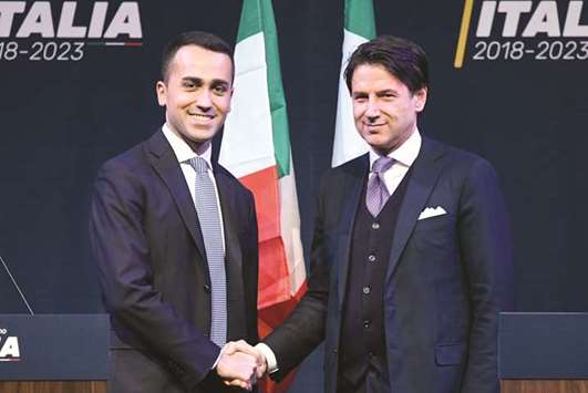 This picture taken on March 1, shows M5S leader Di Maio (left) with Conte.